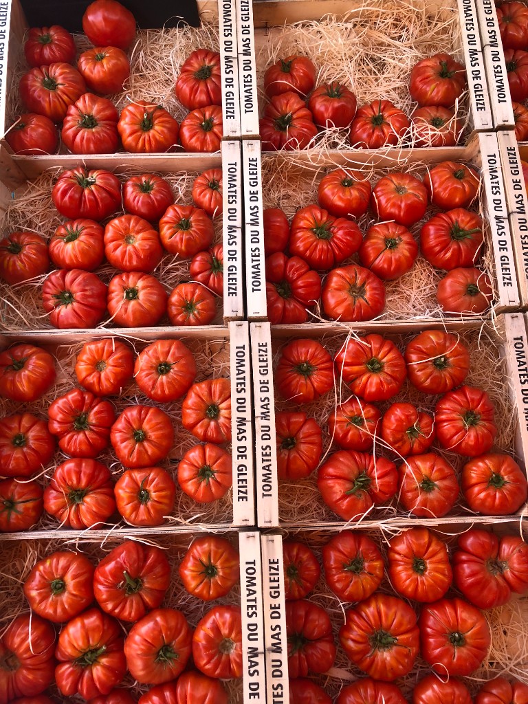 Vine-ripened heirloom tomatoes at a Provençal market